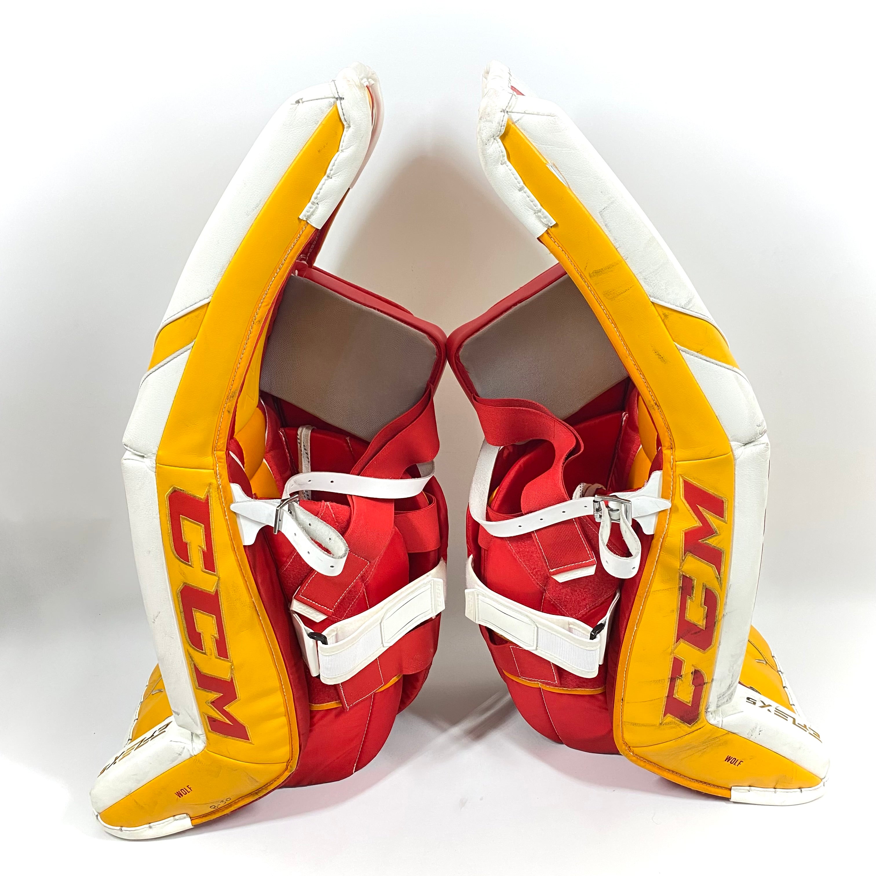 CCM Extreme Flex 5 - Jambières de gardien de but AHL Pro Stock d'occasion (blanc/rouge/jaune)